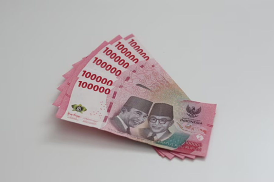 <p>Ilustrasi uang rupiah. Berikut cara cek bansos Kemensos triwulan kedua, jadwal pencairan PKH dan BPNT serta tanda dana bansos siap cair. (Foto: Freepik).</p>
